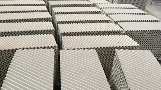 Do Ceramic Structured Packings Need to Be Perforated?